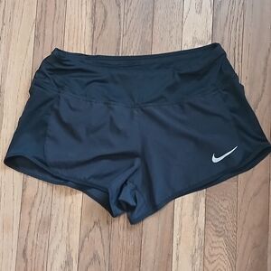Nike Women's Black Athletic Running Shorts with Silver Swoosh